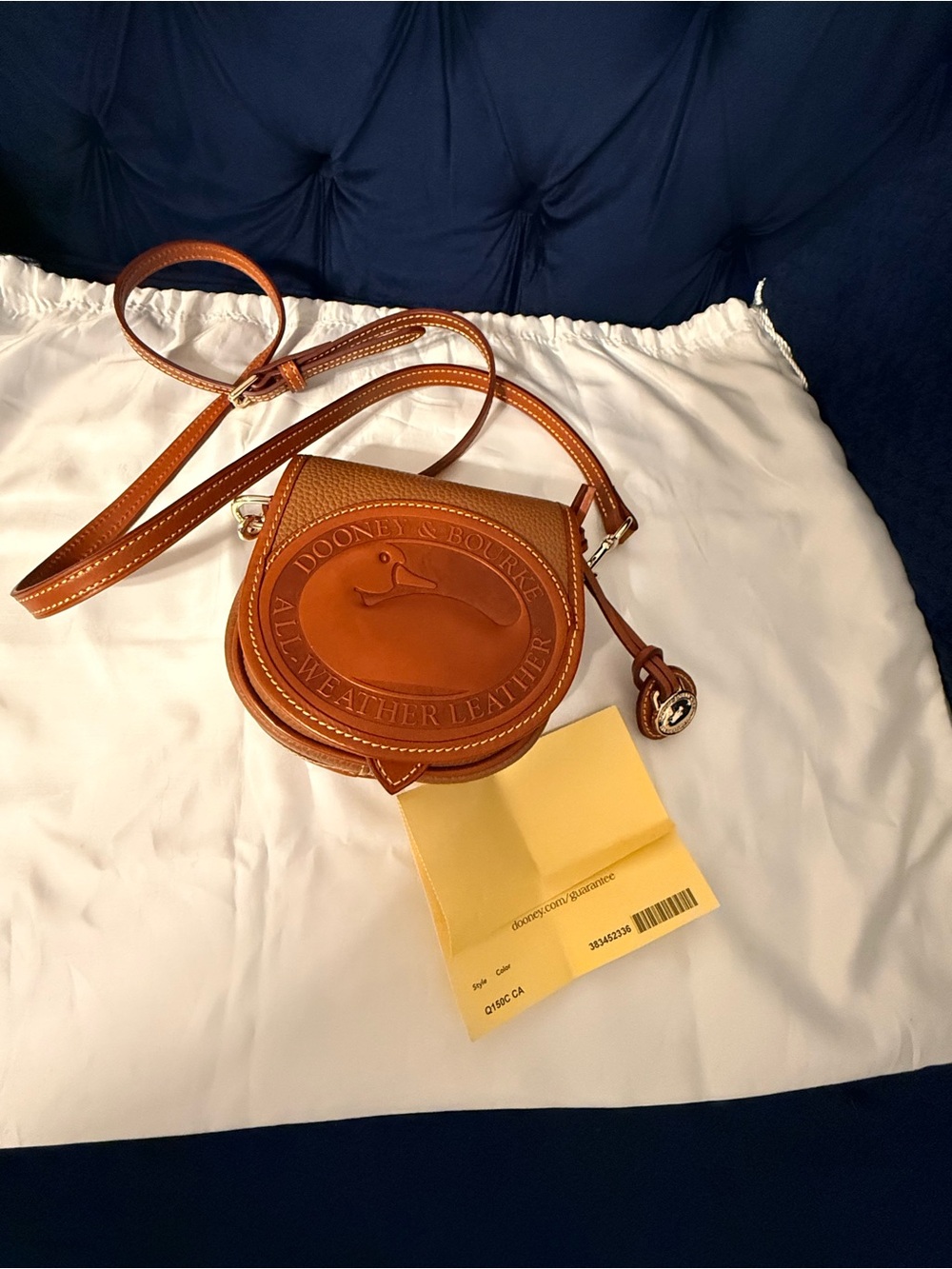 Dooney & Bourke Cognac Brown Leather Round Duck Crossbody Bag